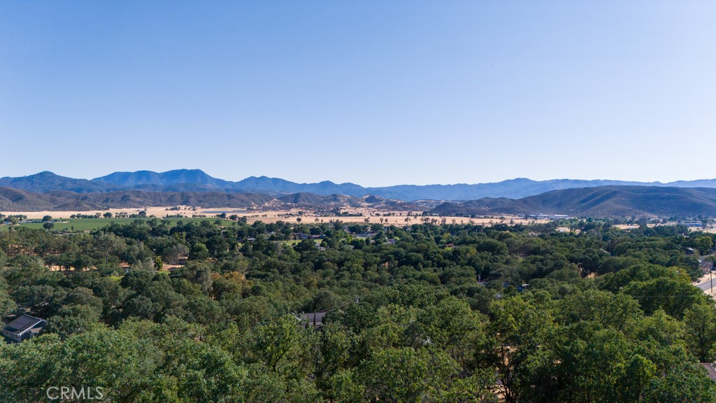 19697 Donkey Hill Road Hidden Valley Lake, CA 95467 - Photo 14 of 15 a view of a town with mountains in the background