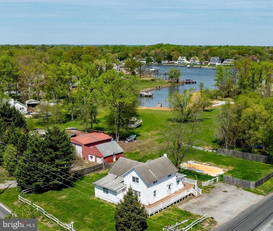 1047 Bowleys Quarters Road Middle River, MD 21220 - Photo 1 of 38 an aerial view of residential houses with outdoor space and river
