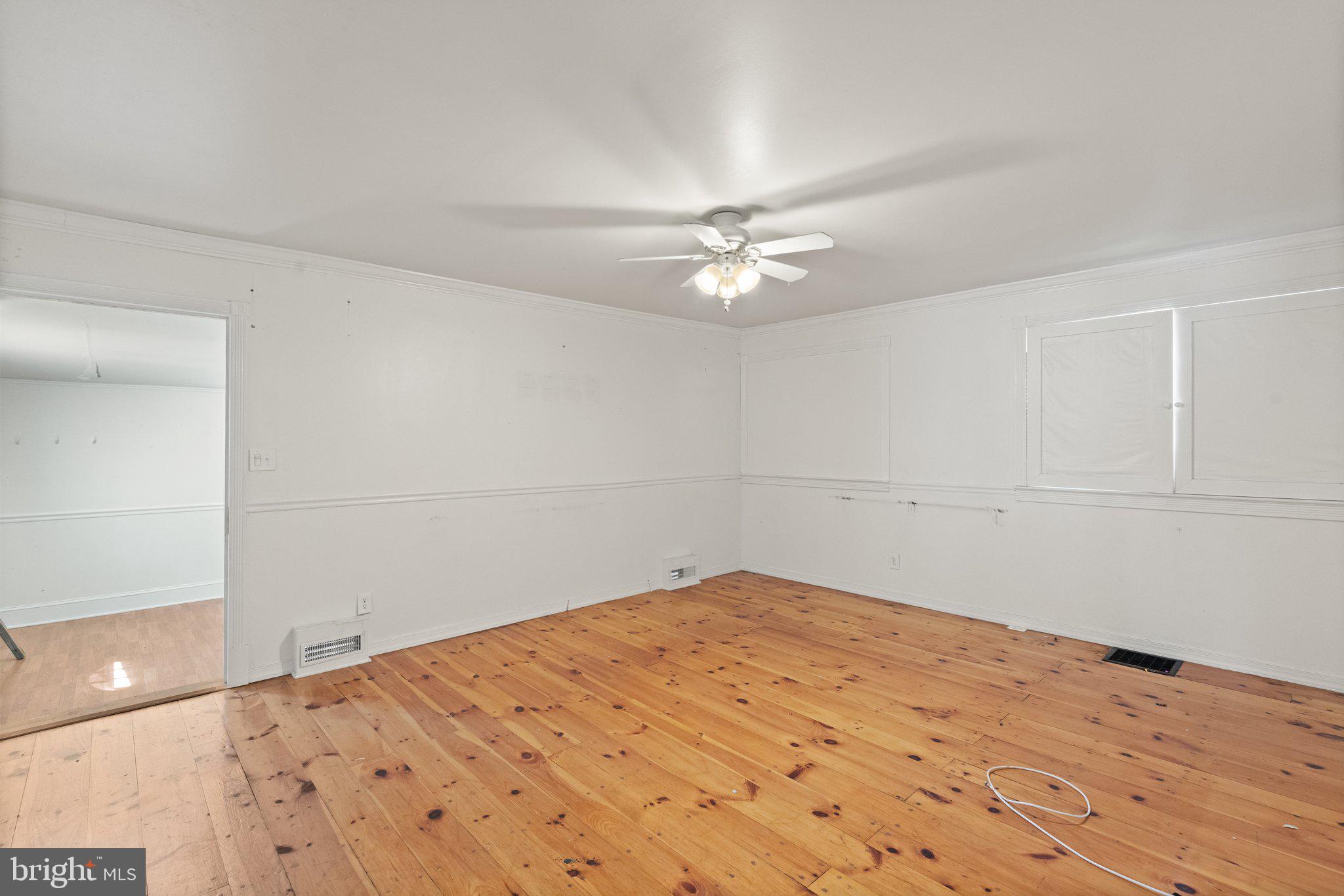 1047 Bowleys Quarters Road Middle River, MD 21220 - Photo 23 of 38 a view of a room with a fan