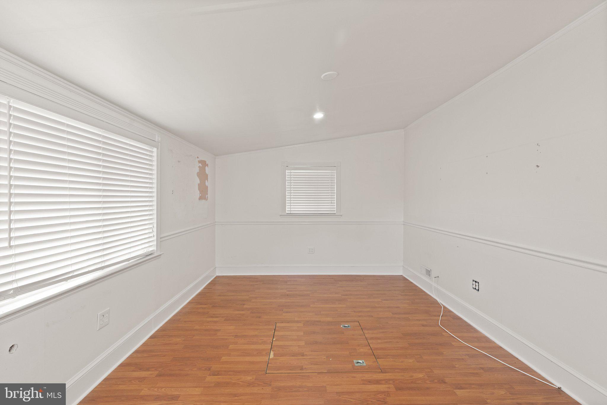 1047 Bowleys Quarters Road Middle River, MD 21220 - Photo 25 of 38 wooden floor in an empty room with a window