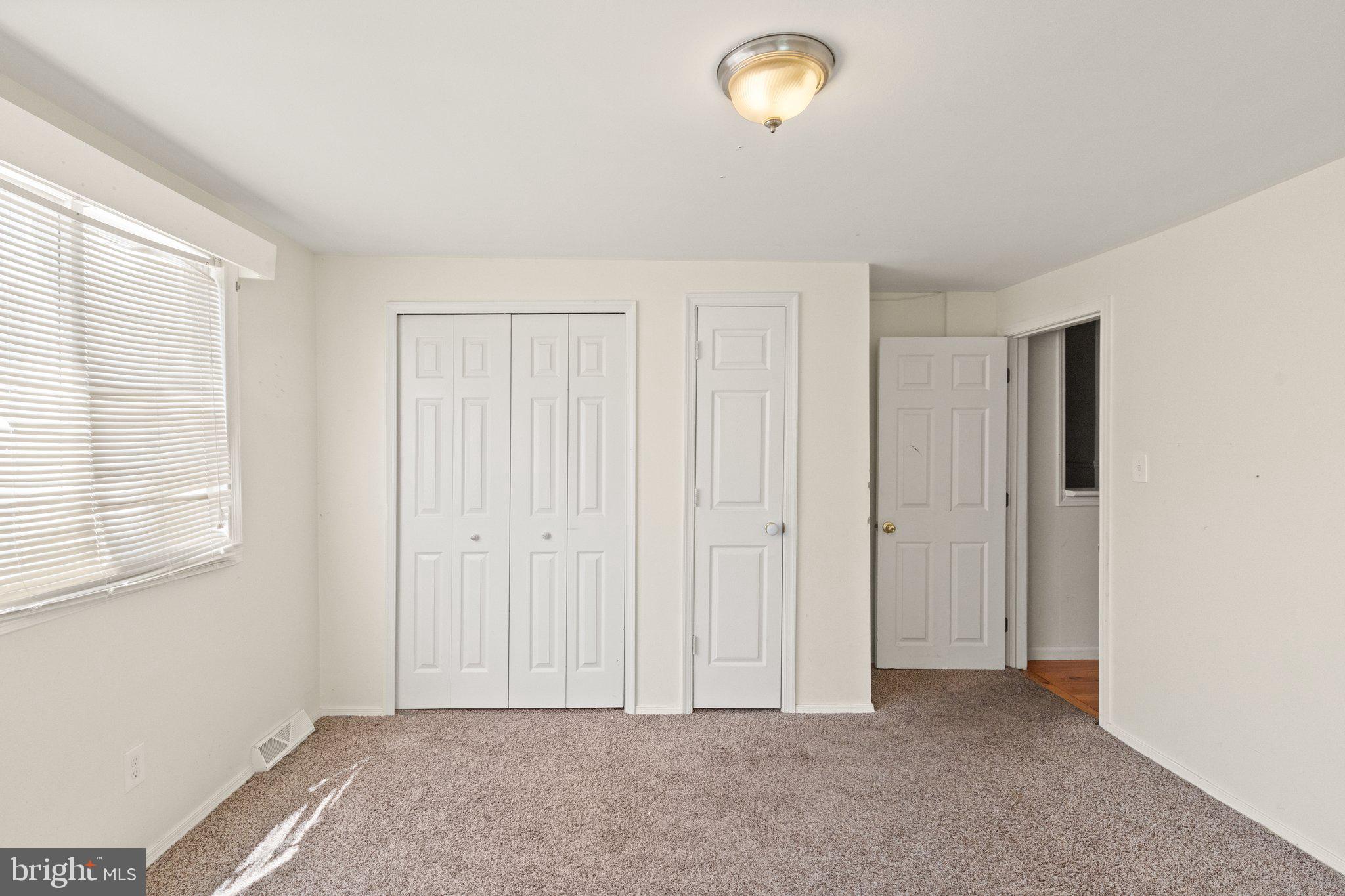 1047 Bowleys Quarters Road Middle River, MD 21220 - Photo 28 of 38 an empty room with windows