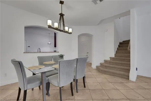 a view of a dining room with furniture