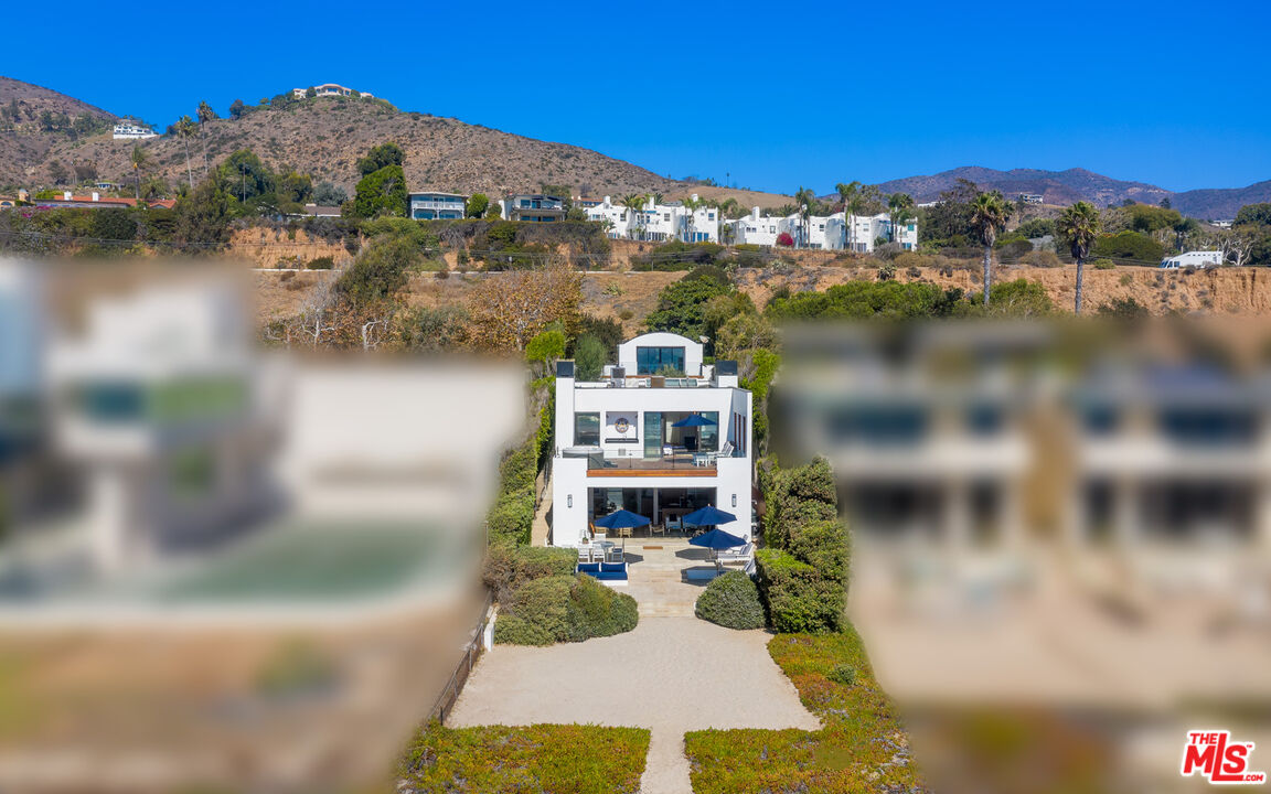 31240 Broad Beach Road Malibu, CA 90265 - Photo 44 of 54 a view of a lake with a big yard