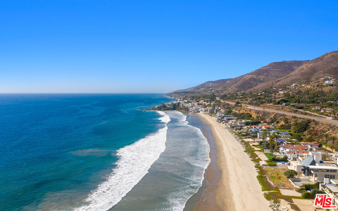31240 Broad Beach Road Malibu, CA 90265 - Photo 46 of 54 a view of a lake with mountains in the background