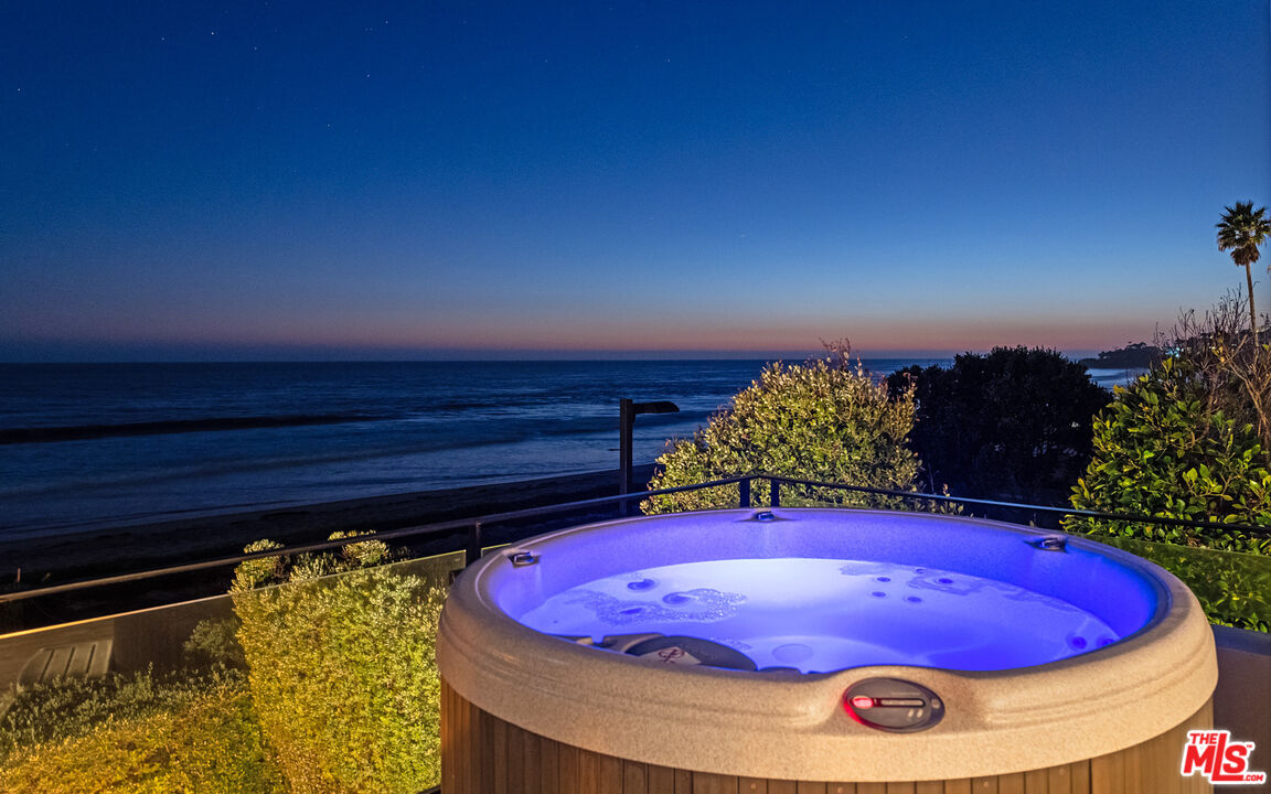31240 Broad Beach Road Malibu, CA 90265 - Photo 53 of 54 a view of a wooden floor with a house in the background
