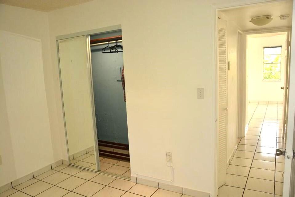 453 Southwest 2nd Street, Unit 208B Miami, FL 33130 - Photo 8 of 23 a view of front door with a bathroom