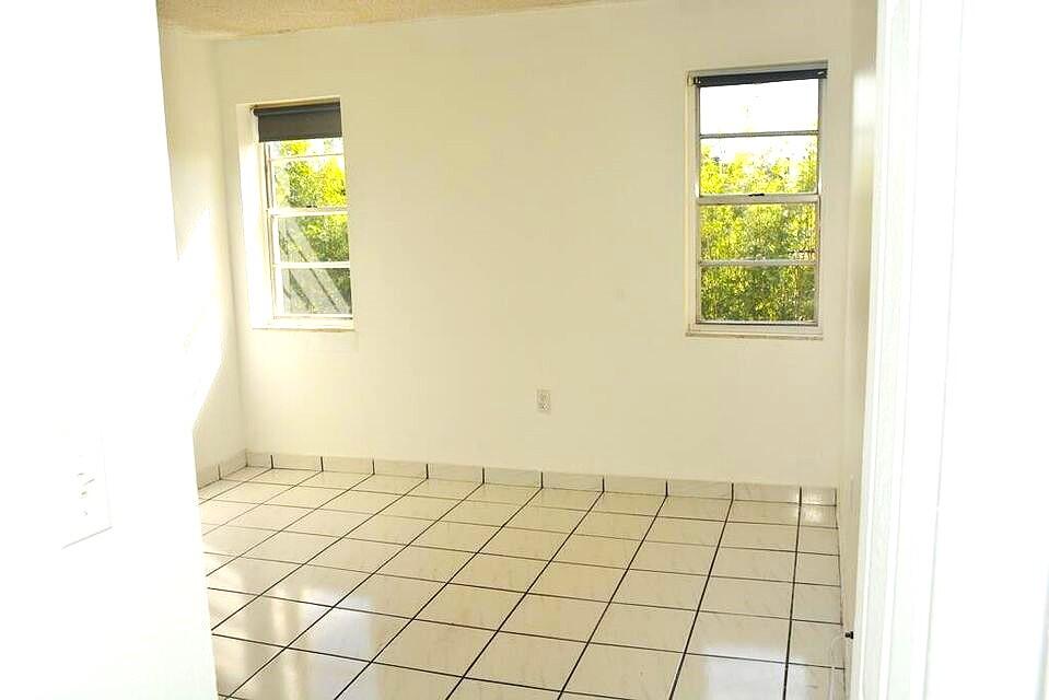 453 Southwest 2nd Street, Unit 208B Miami, FL 33130 - Photo 9 of 23 a view of an empty room
