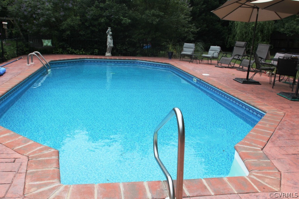14201 Newgate Road Midlothian, VA 23113 - Photo 20 of 24 swimming pool view with a seating space
