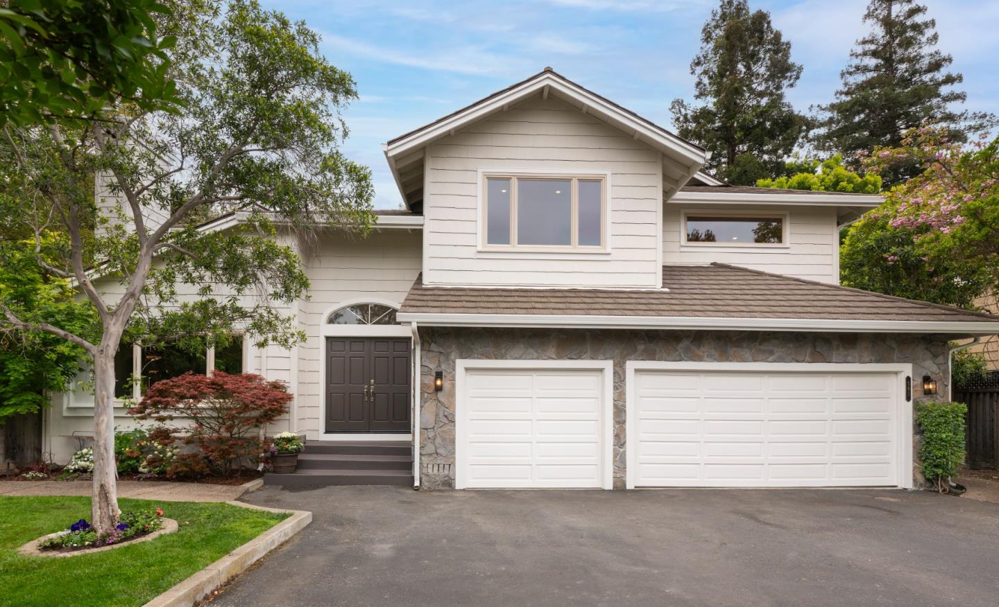 591 Sleeper Avenue Mountain View, CA 94040 - Photo 1 of 1 a front view of a house with garden