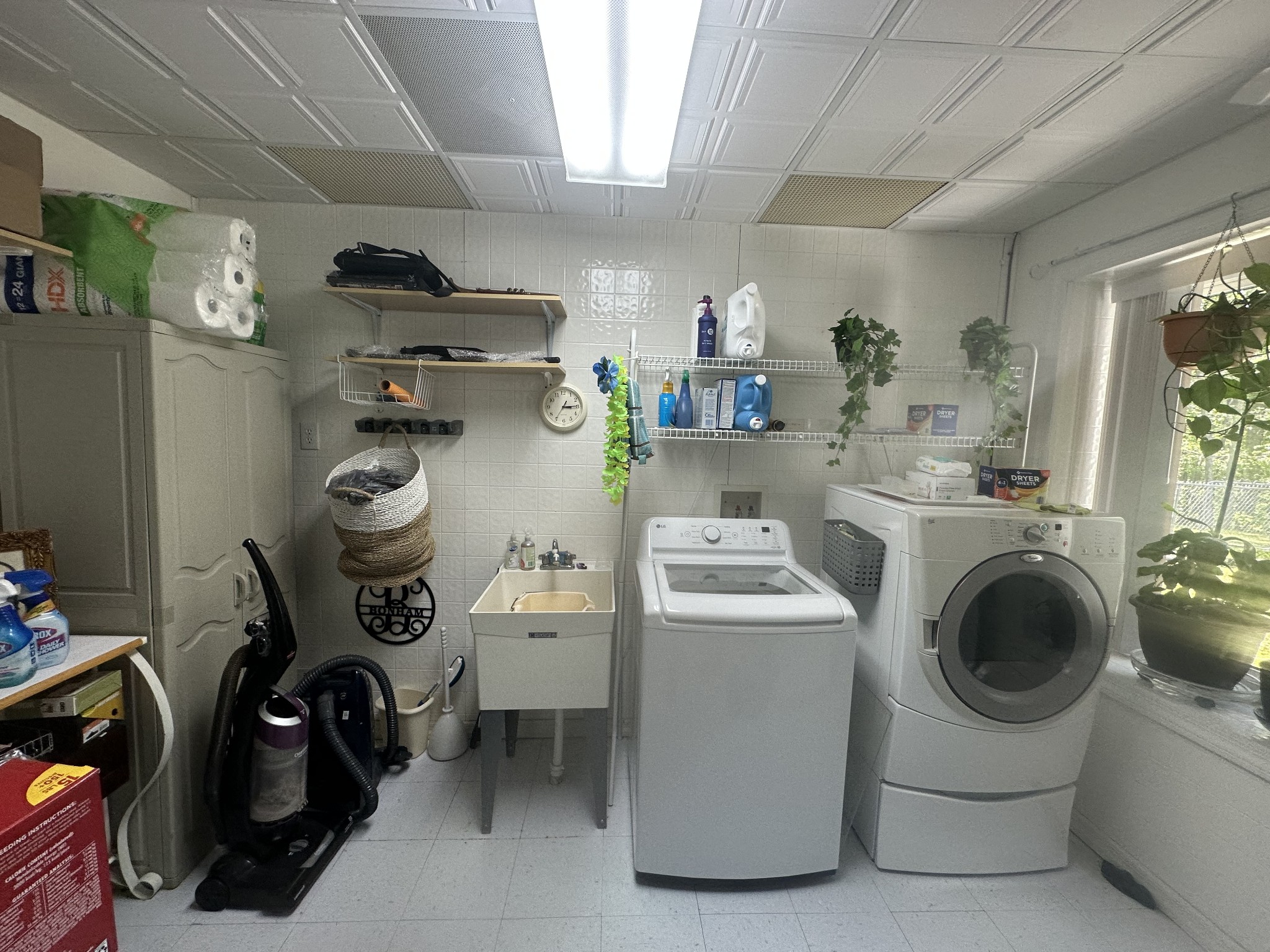 4829 Cole Ridge Road Beechgrove, TN 37018 - Photo 47 of 50 a view of storage and utility room with washer and dryer