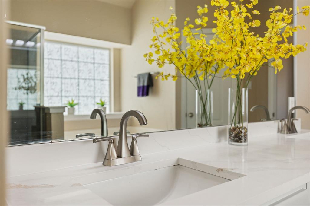 2475 Brazos Drive Frisco, TX 75033 - Photo 18 of 34 a kitchen with a sink and a faucet with wooden floor