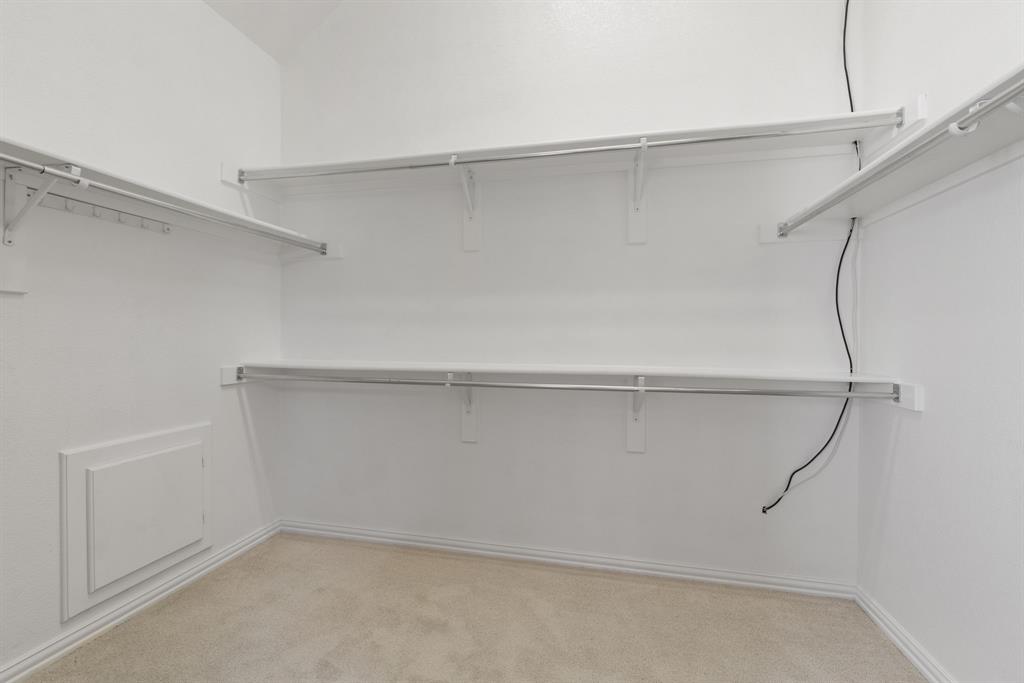 2475 Brazos Drive Frisco, TX 75033 - Photo 20 of 34 a view of an empty walk in closet
