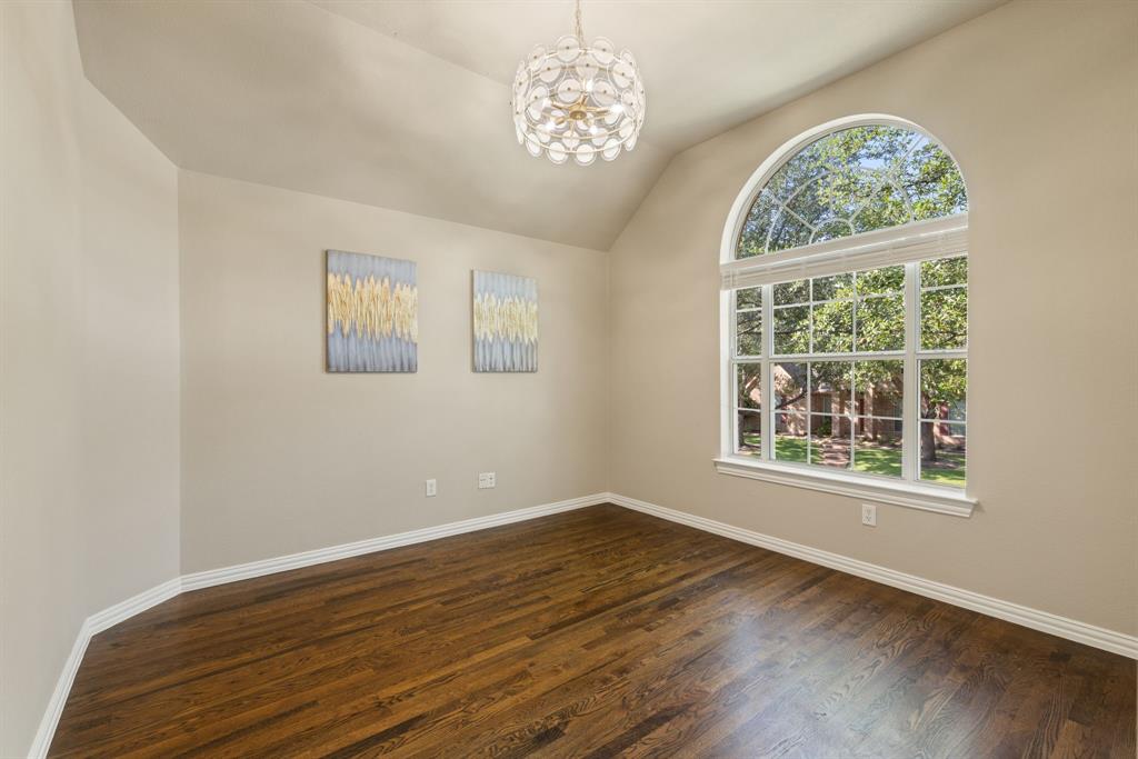 2475 Brazos Drive Frisco, TX 75033 - Photo 23 of 34 a view of an empty room with wooden floor and a window