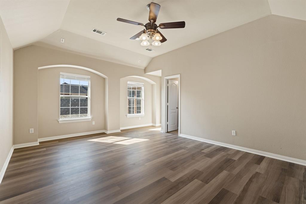 2475 Brazos Drive Frisco, TX 75033 - Photo 28 of 34 a view of an empty room with window and wooden floor