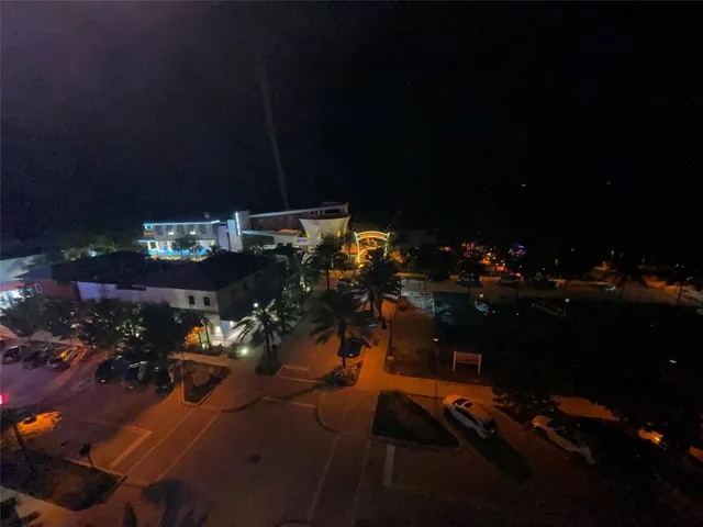 a sitting area with barbeque grill