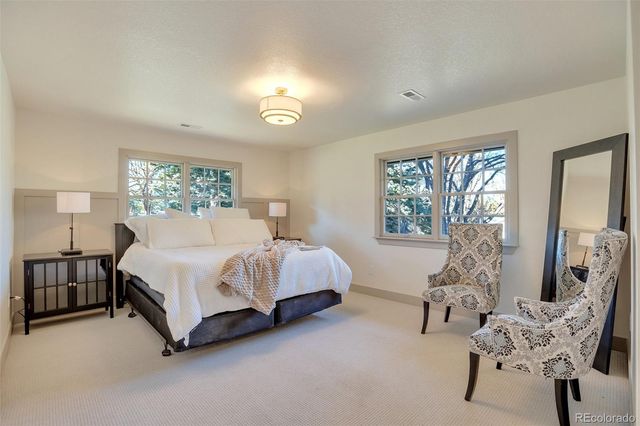 a bathroom with a tub and shower