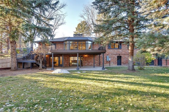 a view of a tree with a yard