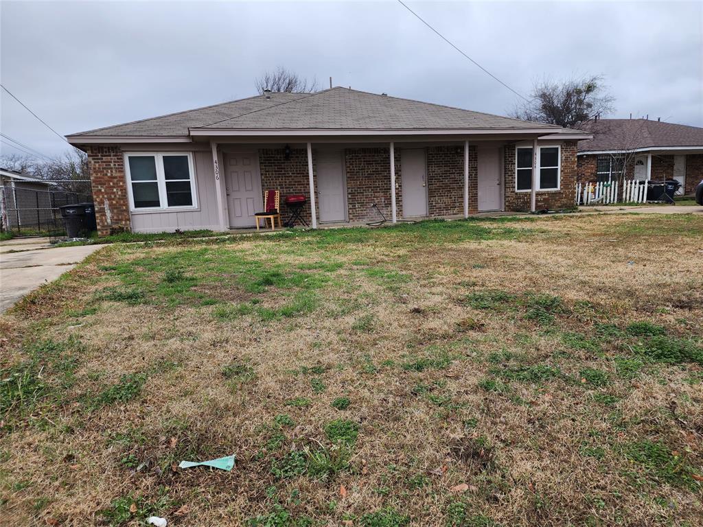 4304 South Cravens Road Fort Worth, TX 76119 - Photo 19 of 21 View of front of property with a front yard