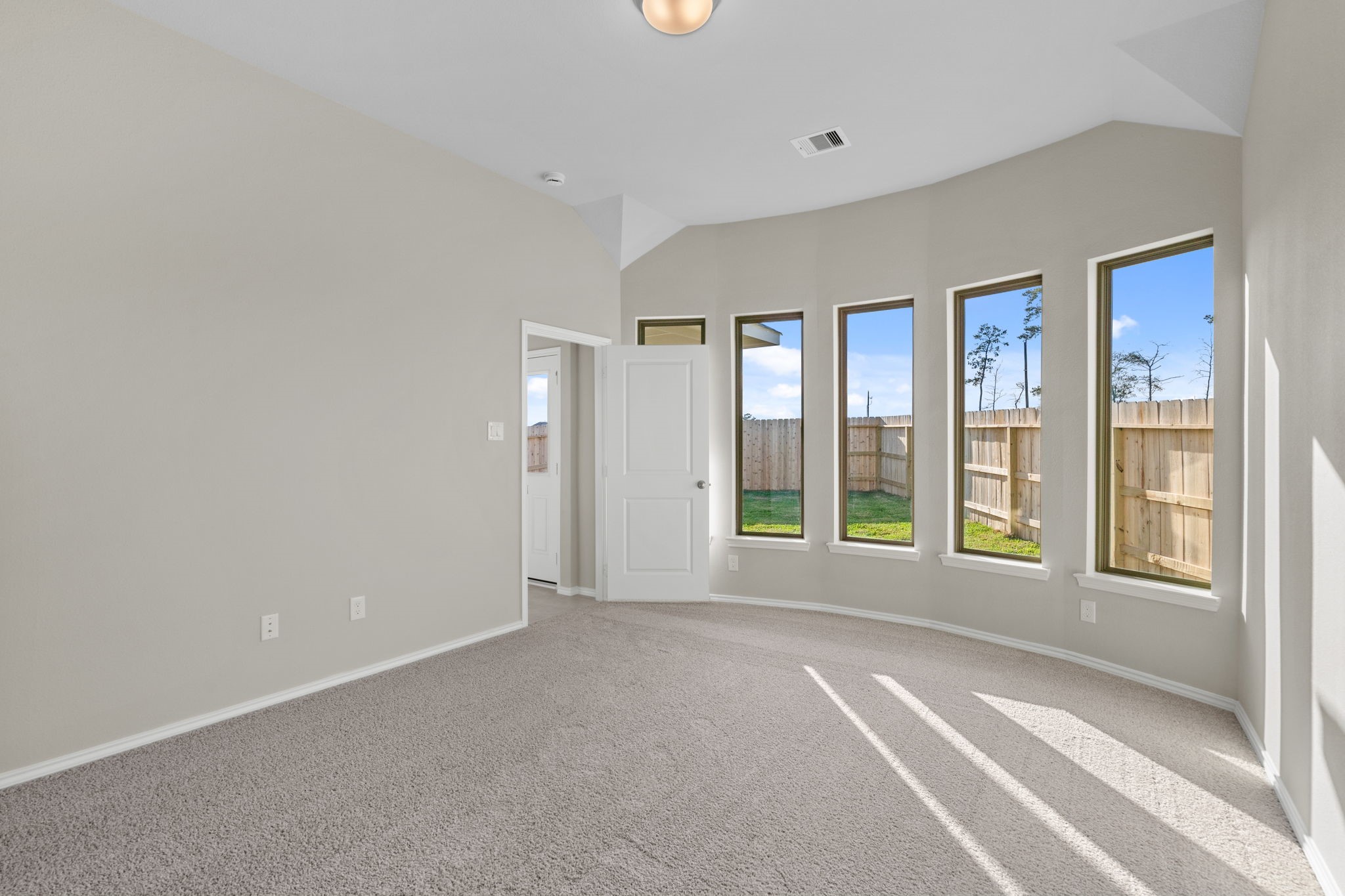 32027 Retama Rnch Drive Spring, TX 77386 - Photo 15 of 33 a view of an empty room with a window