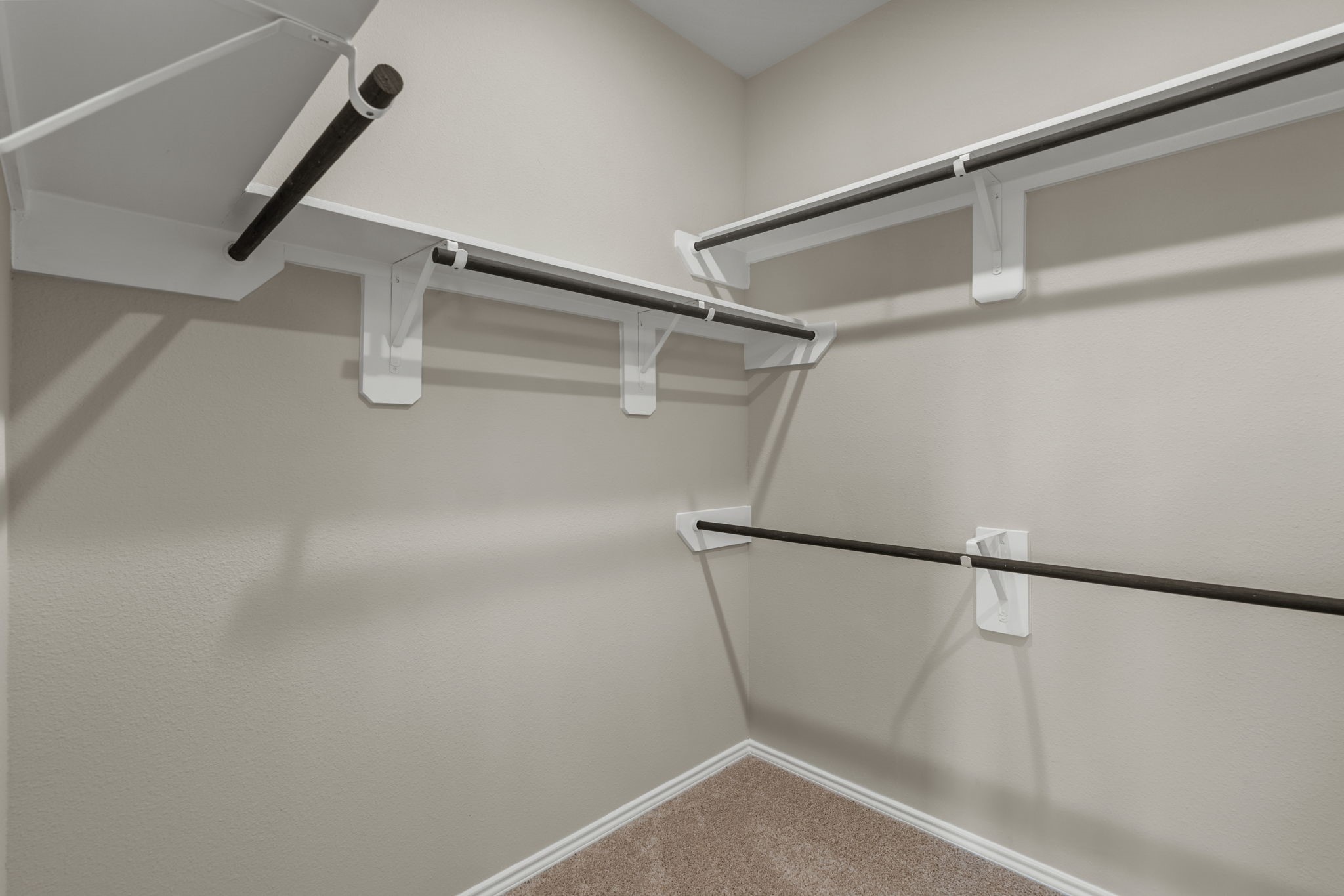 32027 Retama Rnch Drive Spring, TX 77386 - Photo 20 of 33 a view of a room with racks on the wall