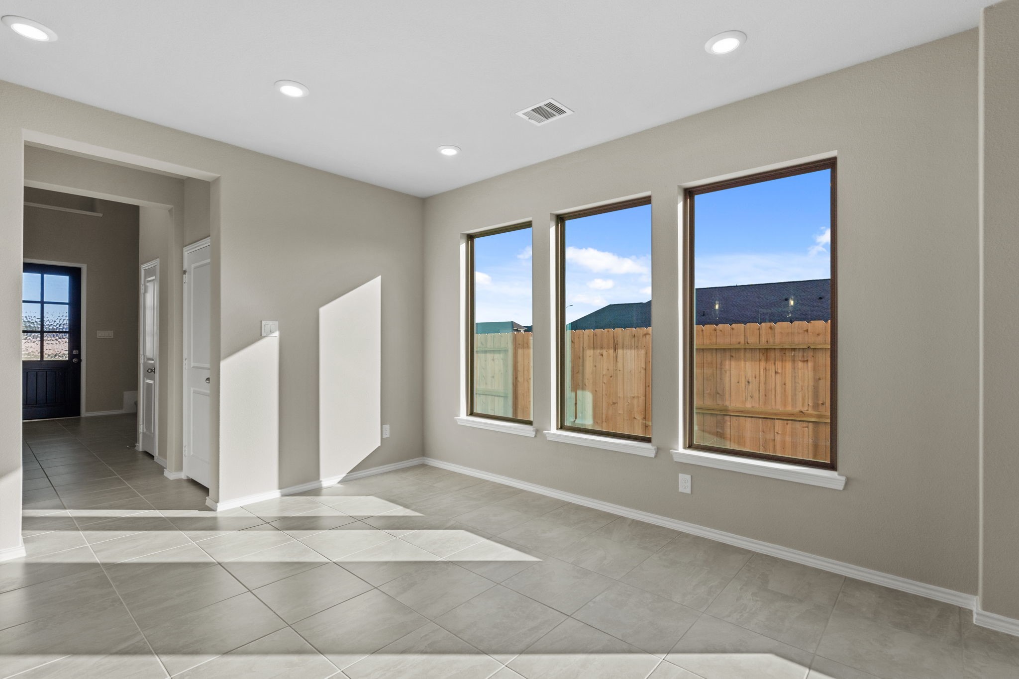 32027 Retama Rnch Drive Spring, TX 77386 - Photo 6 of 33 a view of an empty room with a window