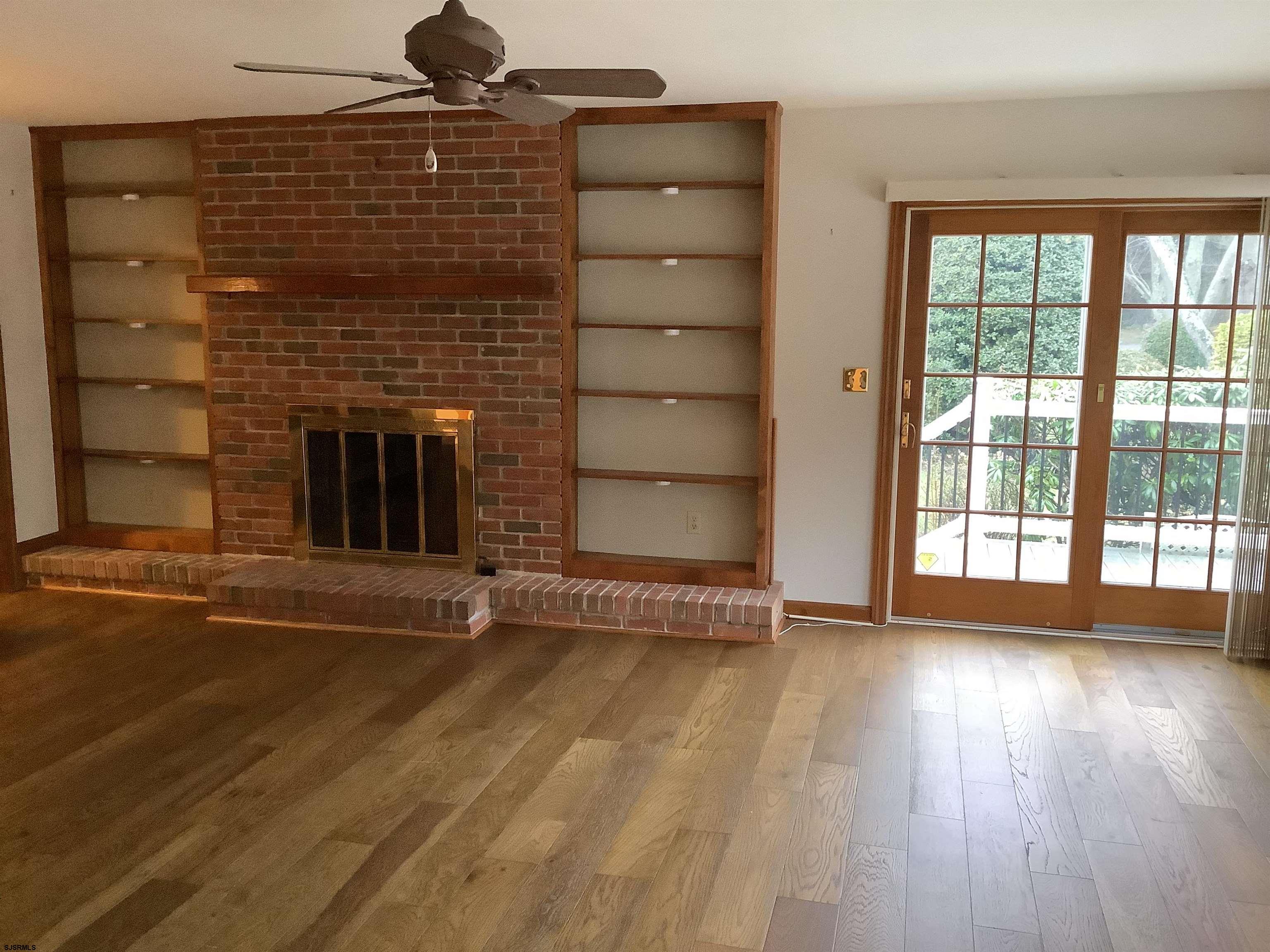 145 Allendale Road Marmora, NJ 08223 - Photo 11 of 27 a view of an empty room with wooden floor and a window
