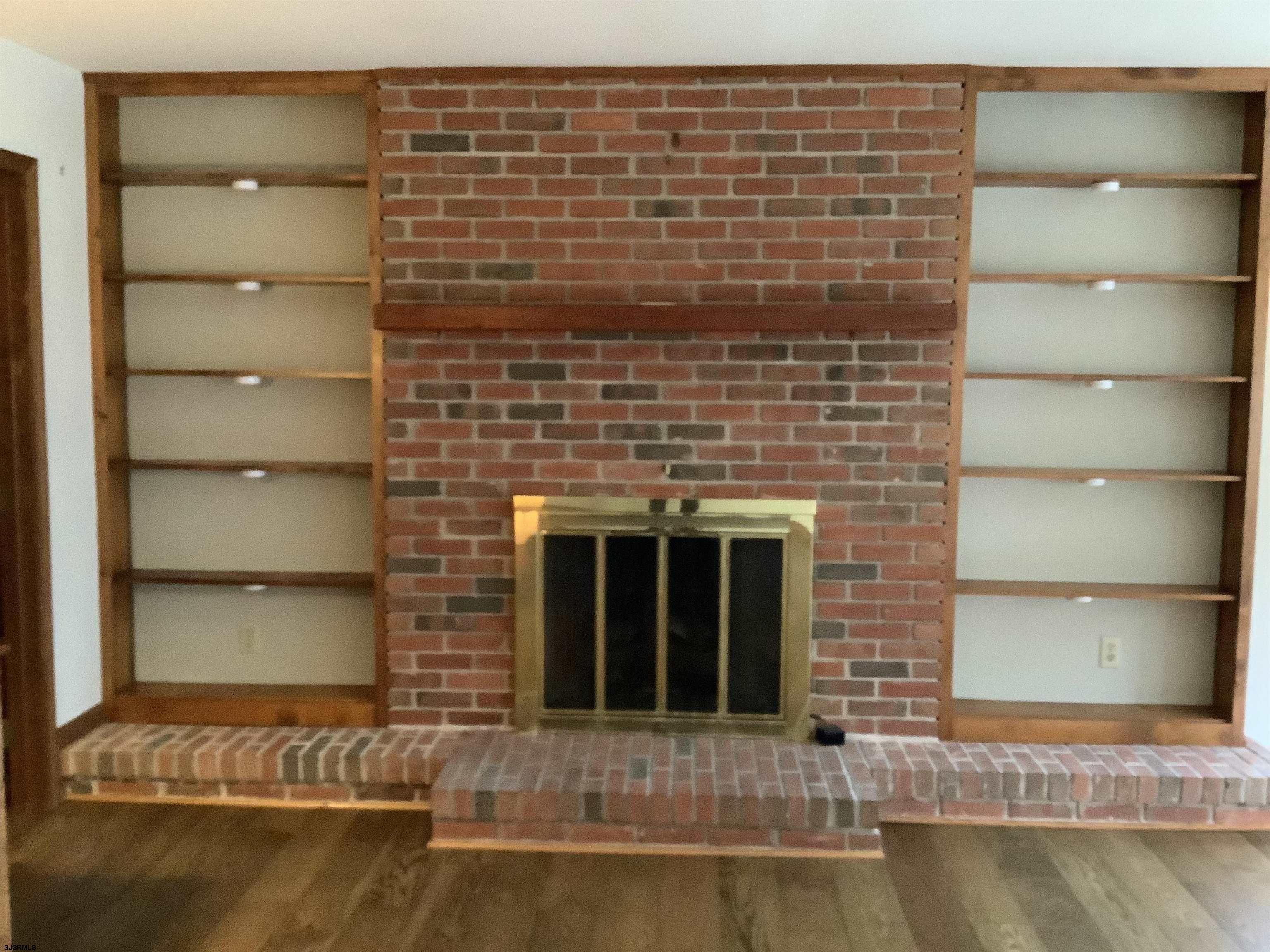 145 Allendale Road Marmora, NJ 08223 - Photo 12 of 27 a front view of a building with a yard and garage