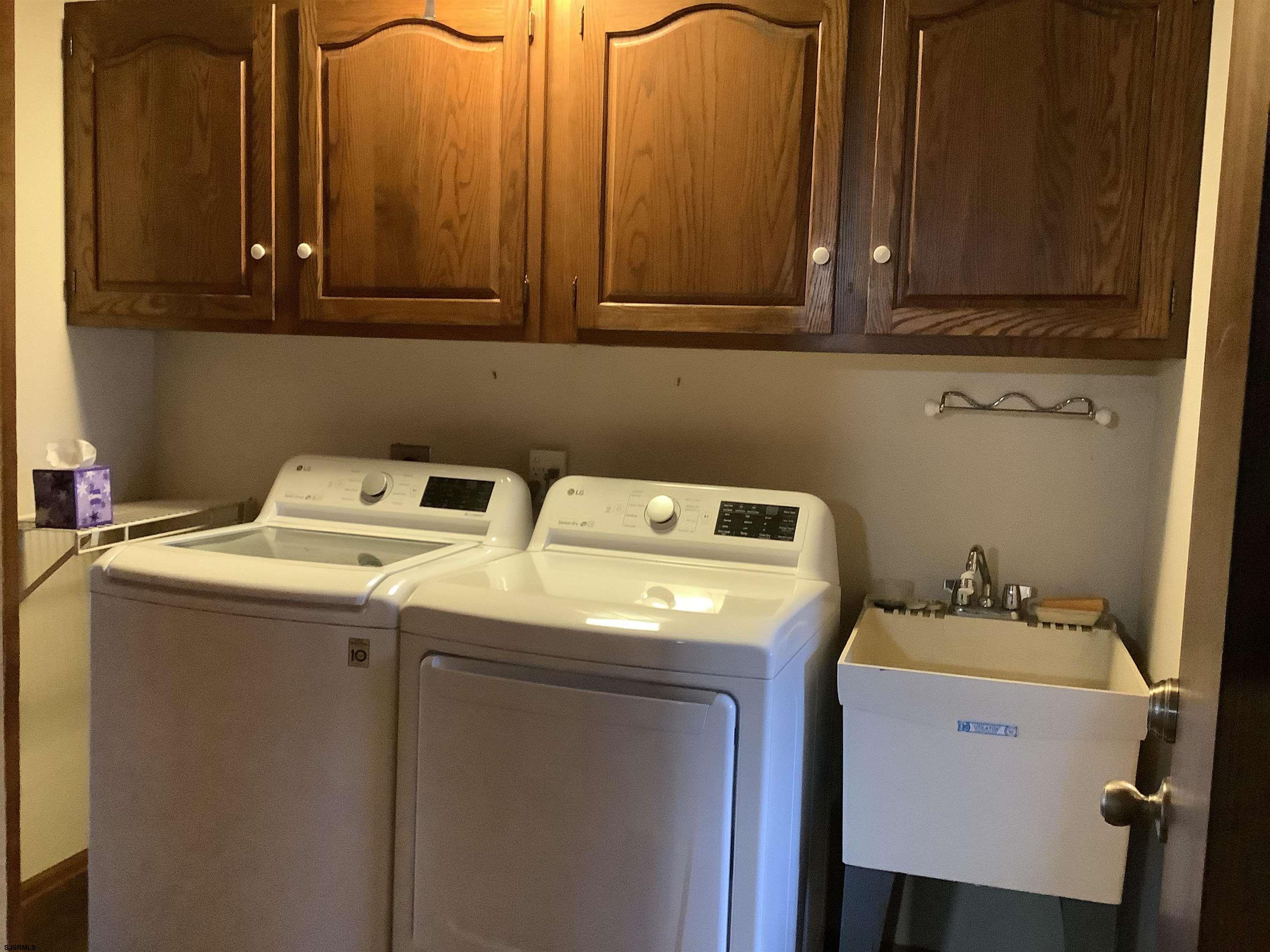 145 Allendale Road Marmora, NJ 08223 - Photo 14 of 27 a utility room with dryer and washer
