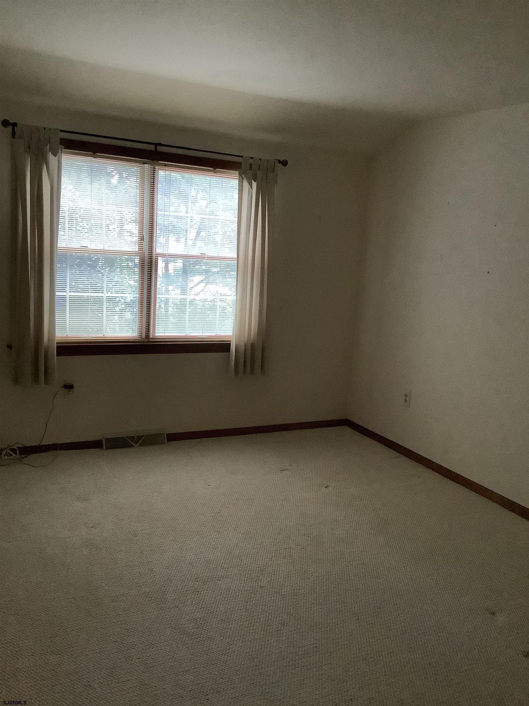 145 Allendale Road Marmora, NJ 08223 - Photo 23 of 27 an empty room with a window