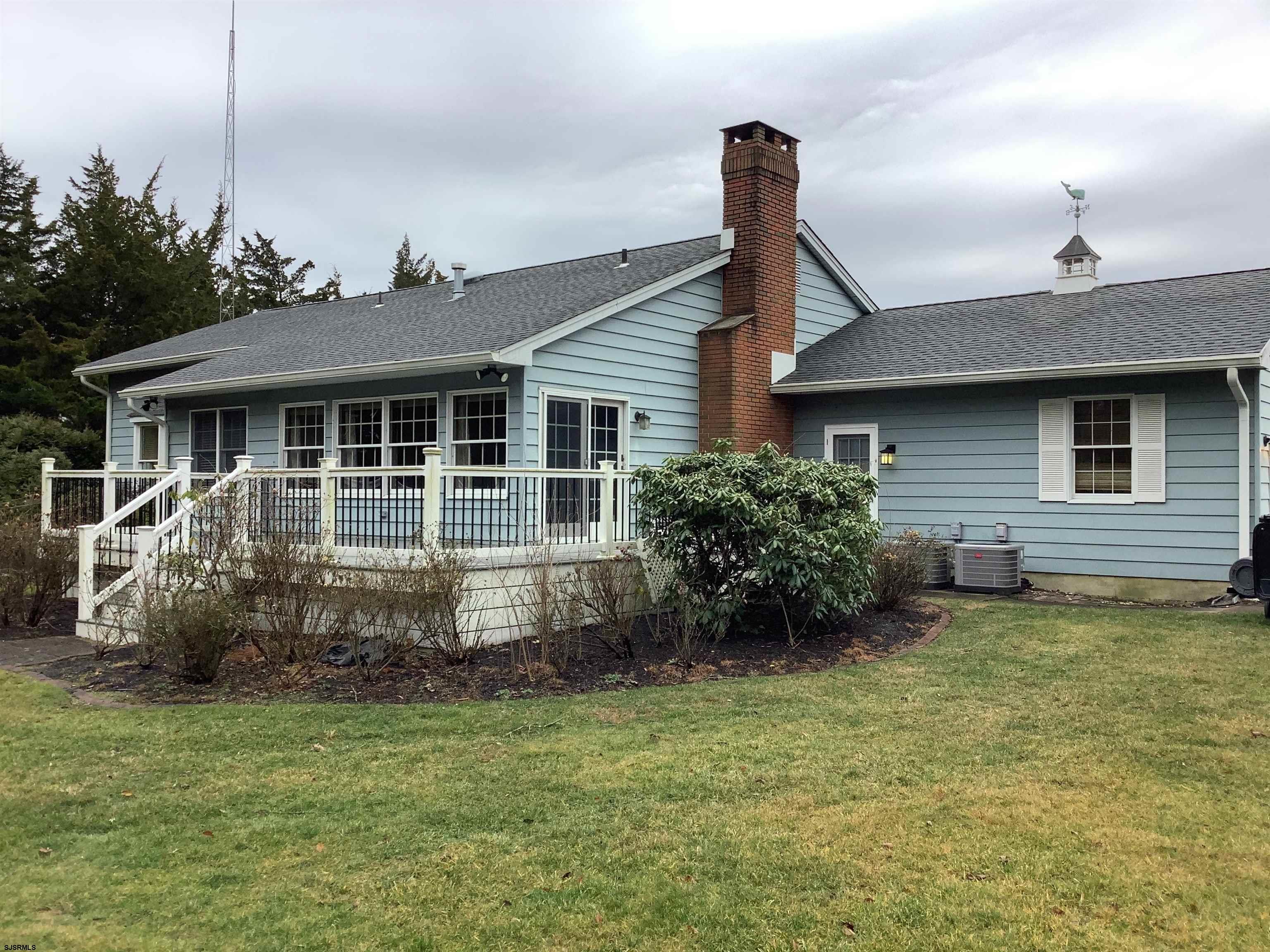 145 Allendale Road Marmora, NJ 08223 - Photo 25 of 27 a view of a house with a garden