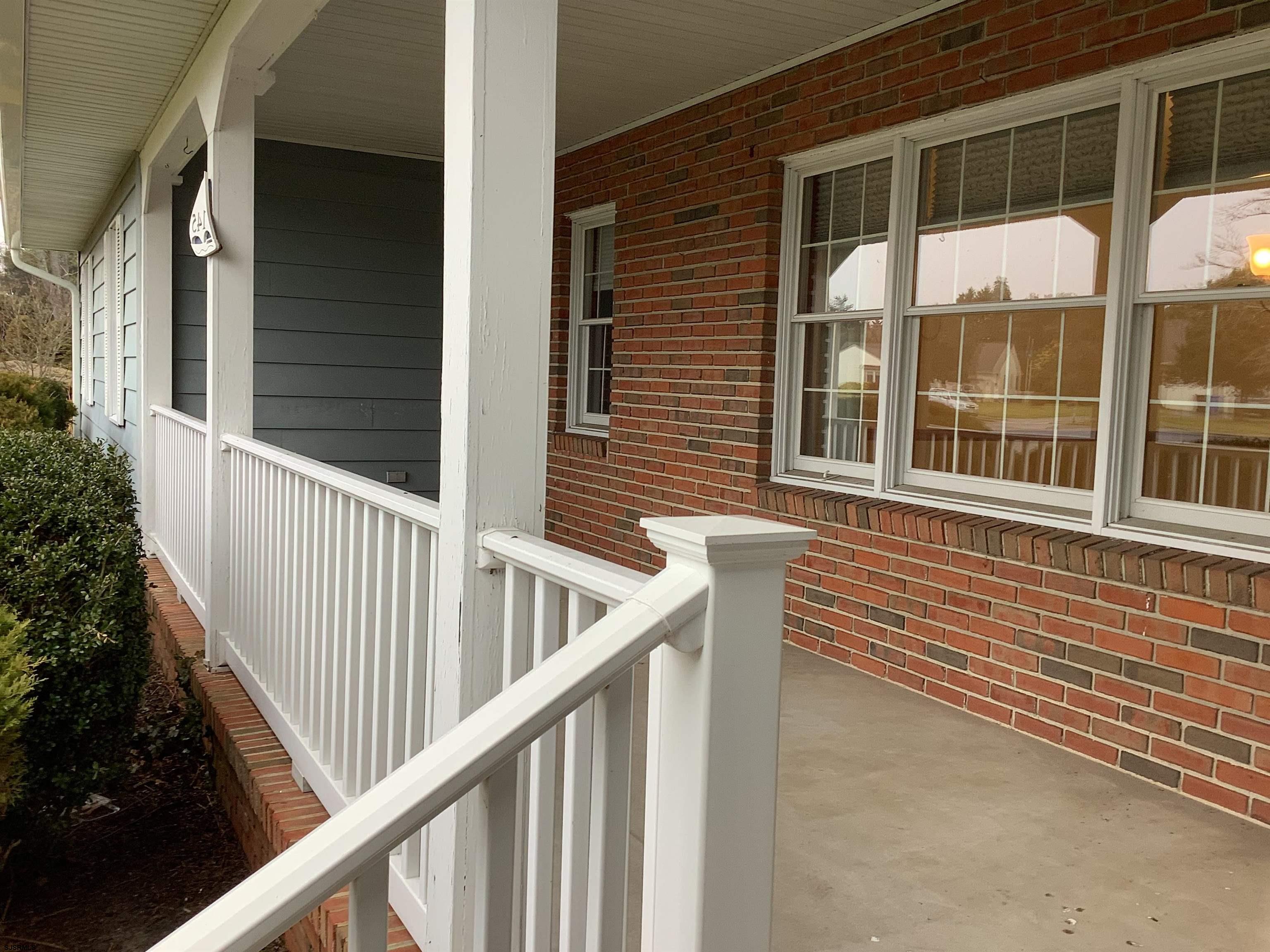 145 Allendale Road Marmora, NJ 08223 - Photo 3 of 27 a view of porch with a bench