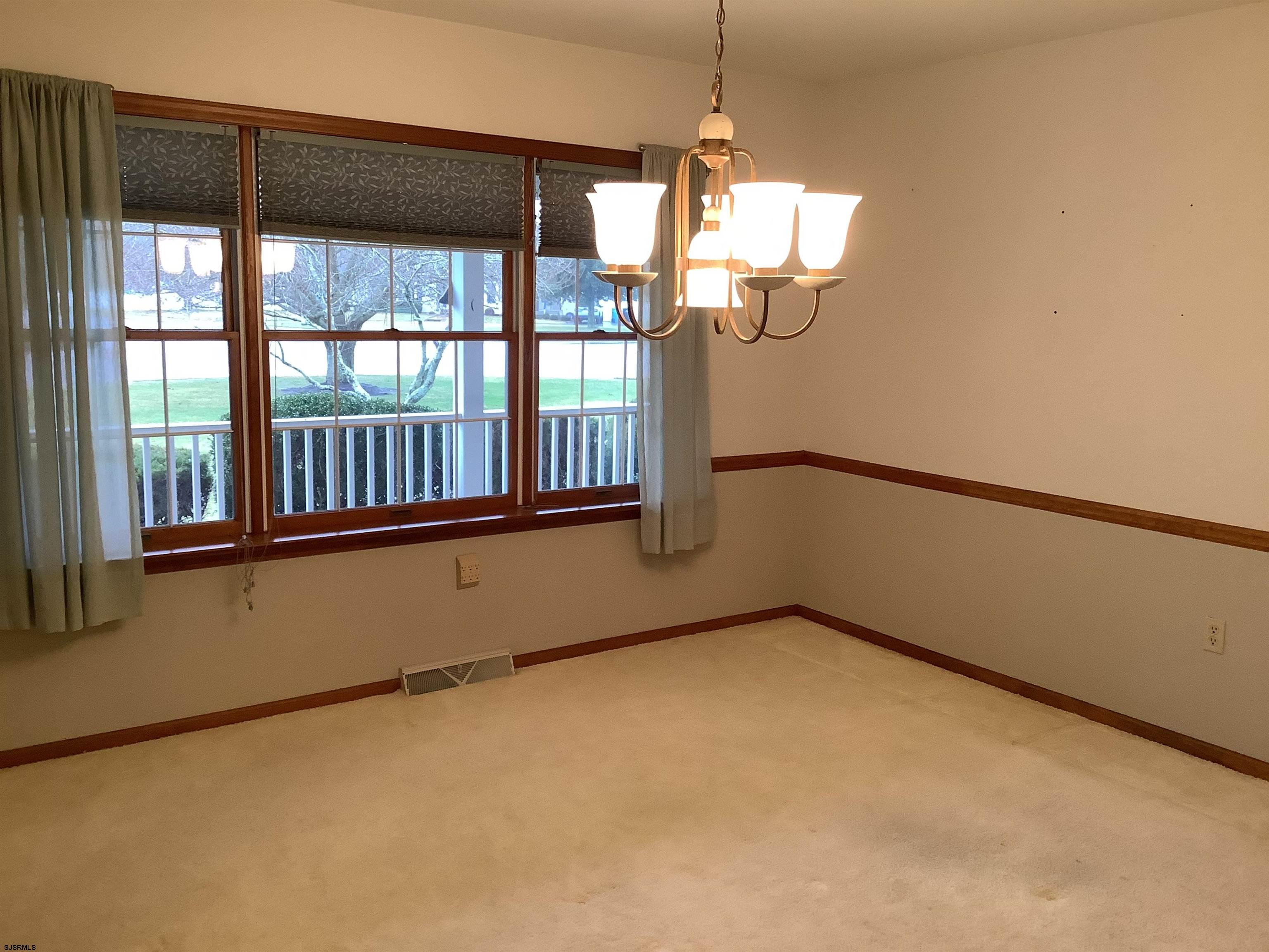 145 Allendale Road Marmora, NJ 08223 - Photo 6 of 27 a view of a room with windows