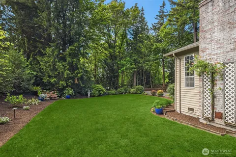 a view of a backyard with a garden
