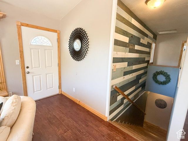 425 East Mule Deer Road Central, UT 84722 - Photo 20 of 72 Entrance foyer with dark wood-style flooring, baseboards, and wood walls