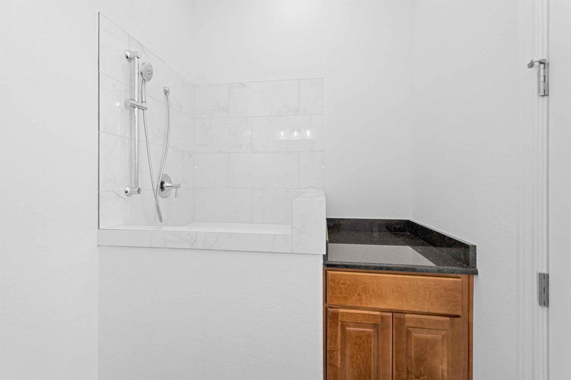 16081 Forest Mill Road Willis, TX 77378 - Photo 20 of 39 a bathroom with a granite countertop sink and vanity