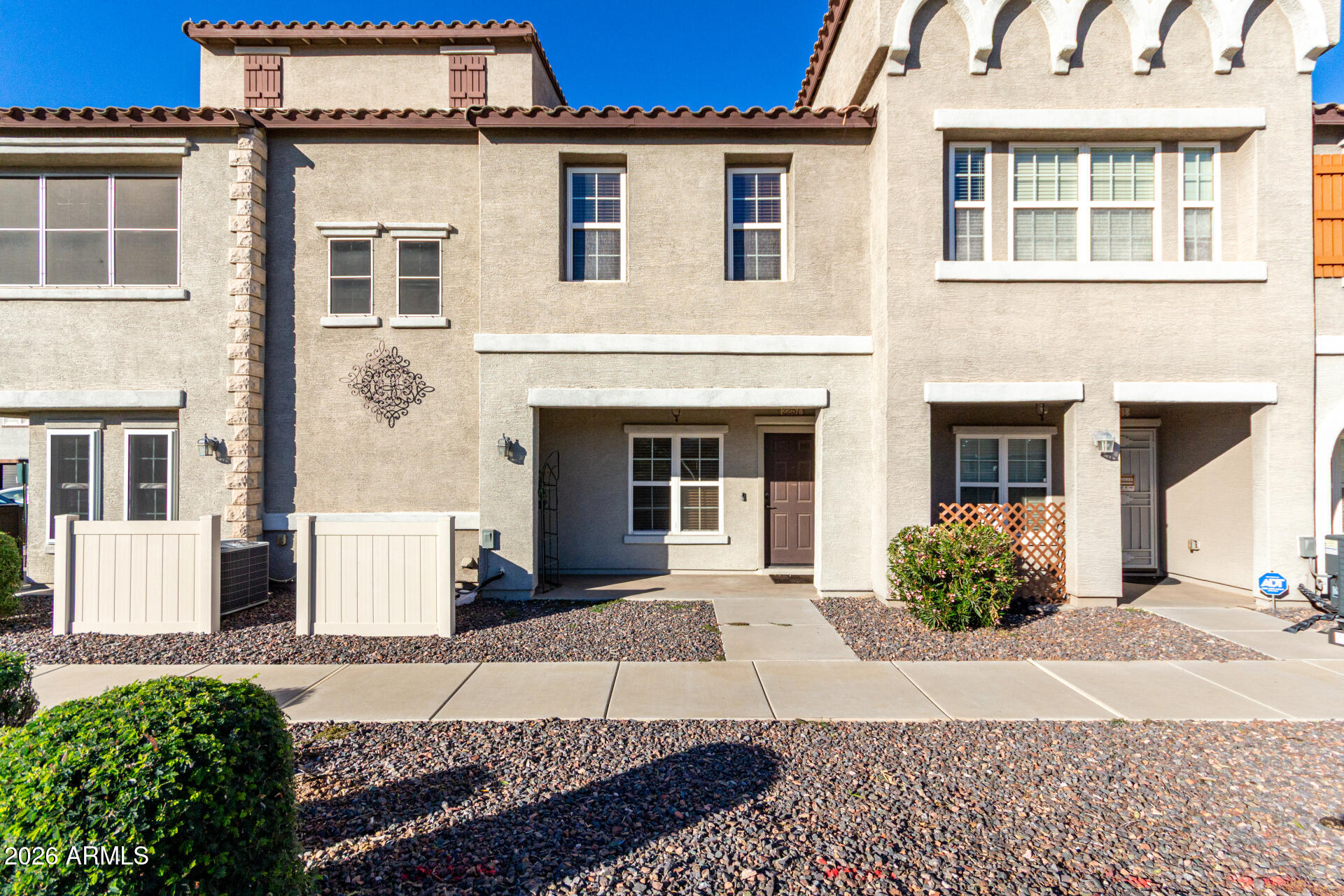 2257 East Huntington Drive Phoenix, AZ 85040 - Photo 1 of 25 a front view of a house with a garden