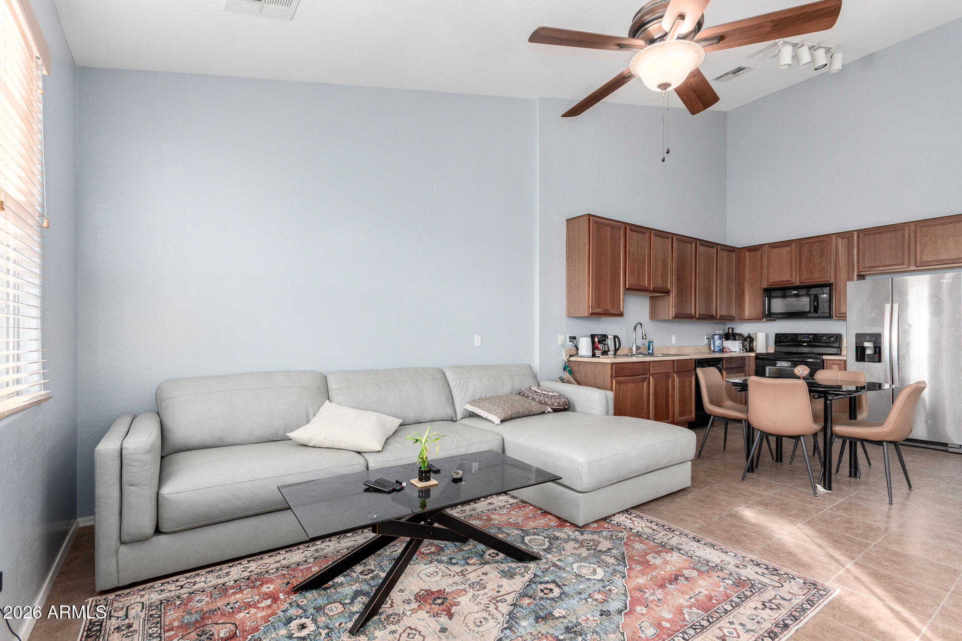 2257 East Huntington Drive Phoenix, AZ 85040 - Photo 11 of 25 a living room with furniture kitchen view and a window