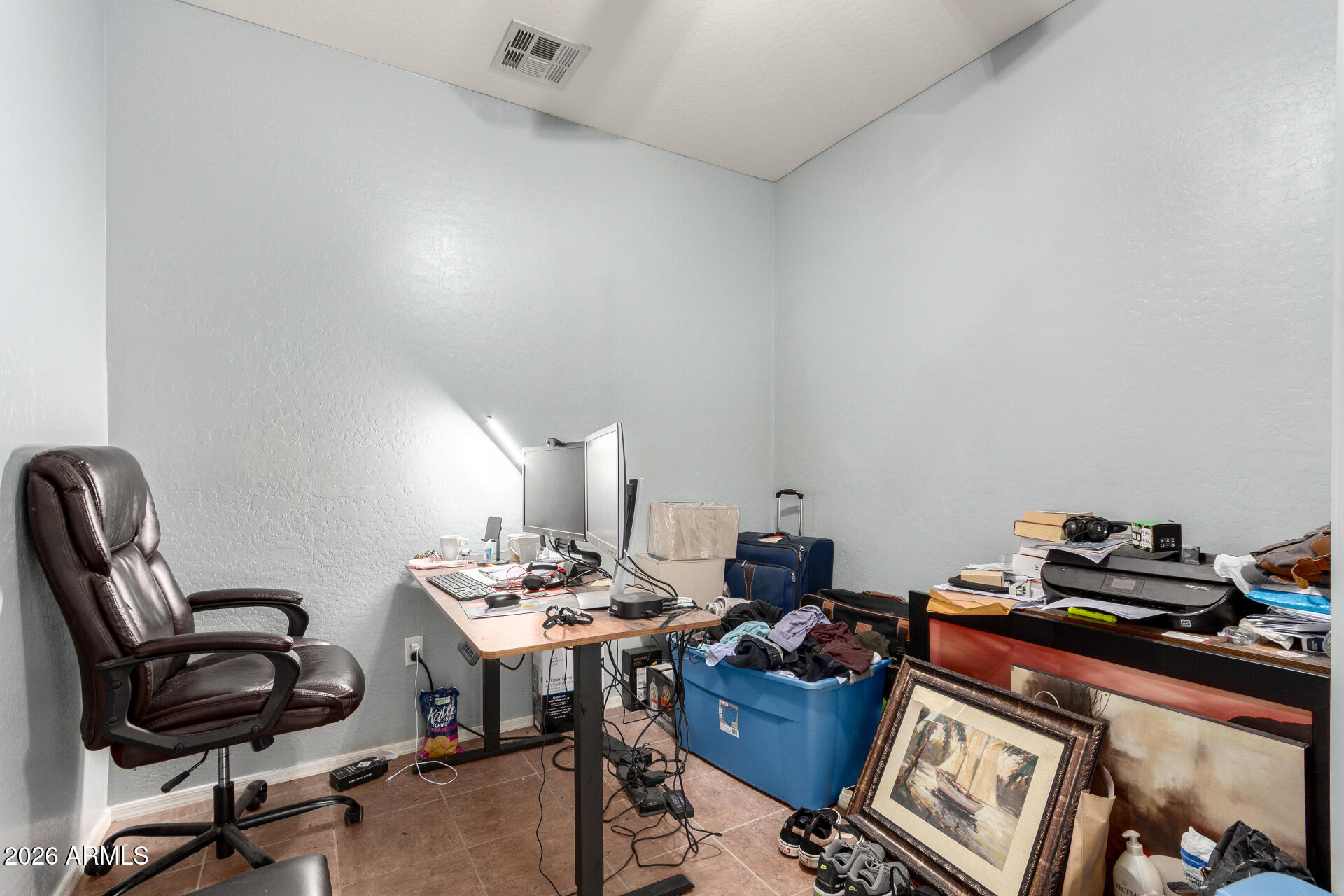 2257 East Huntington Drive Phoenix, AZ 85040 - Photo 20 of 25 a view of a workspace with furniture