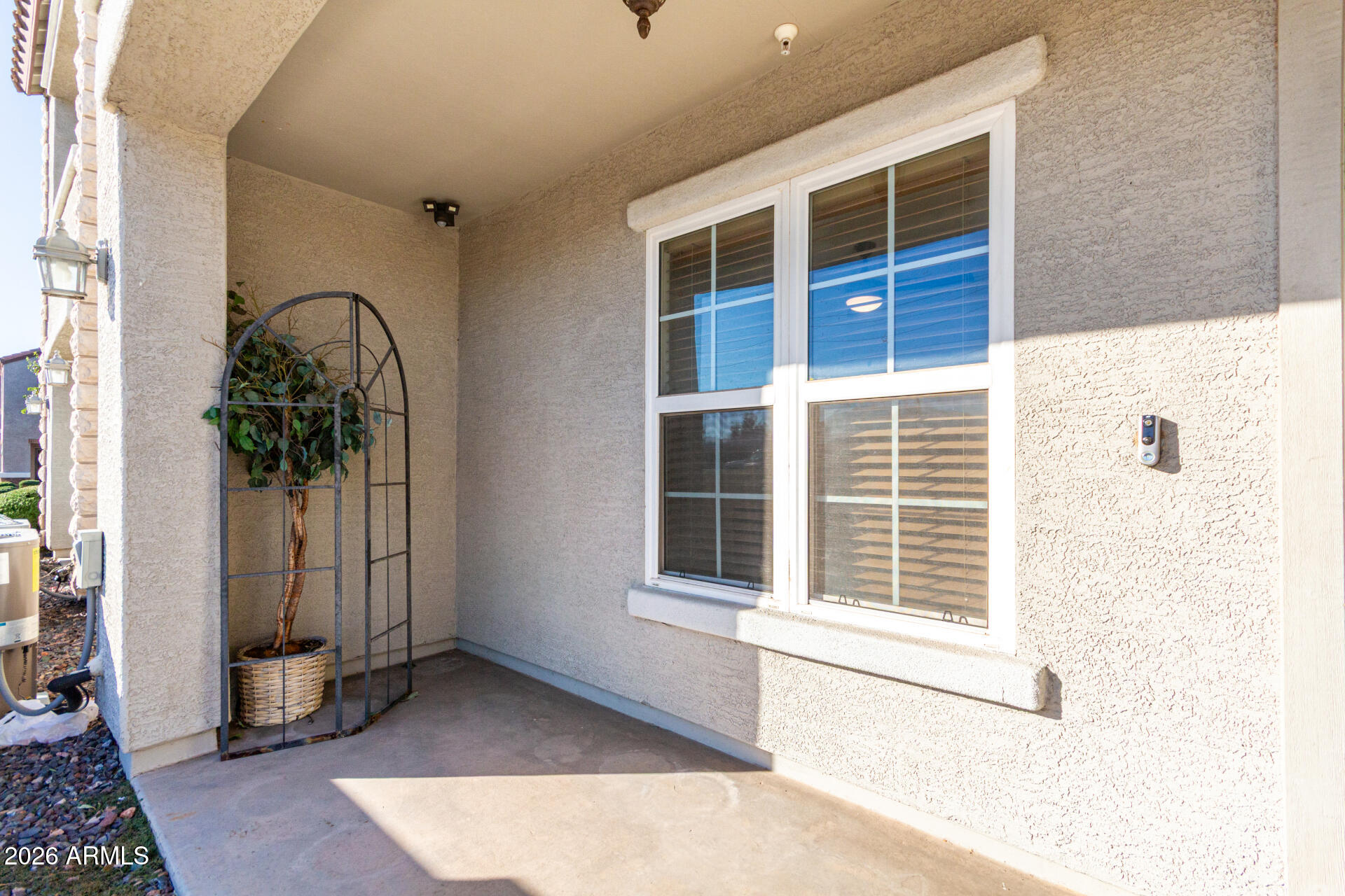 2257 East Huntington Drive Phoenix, AZ 85040 - Photo 4 of 25 a view of a door of a house with a window