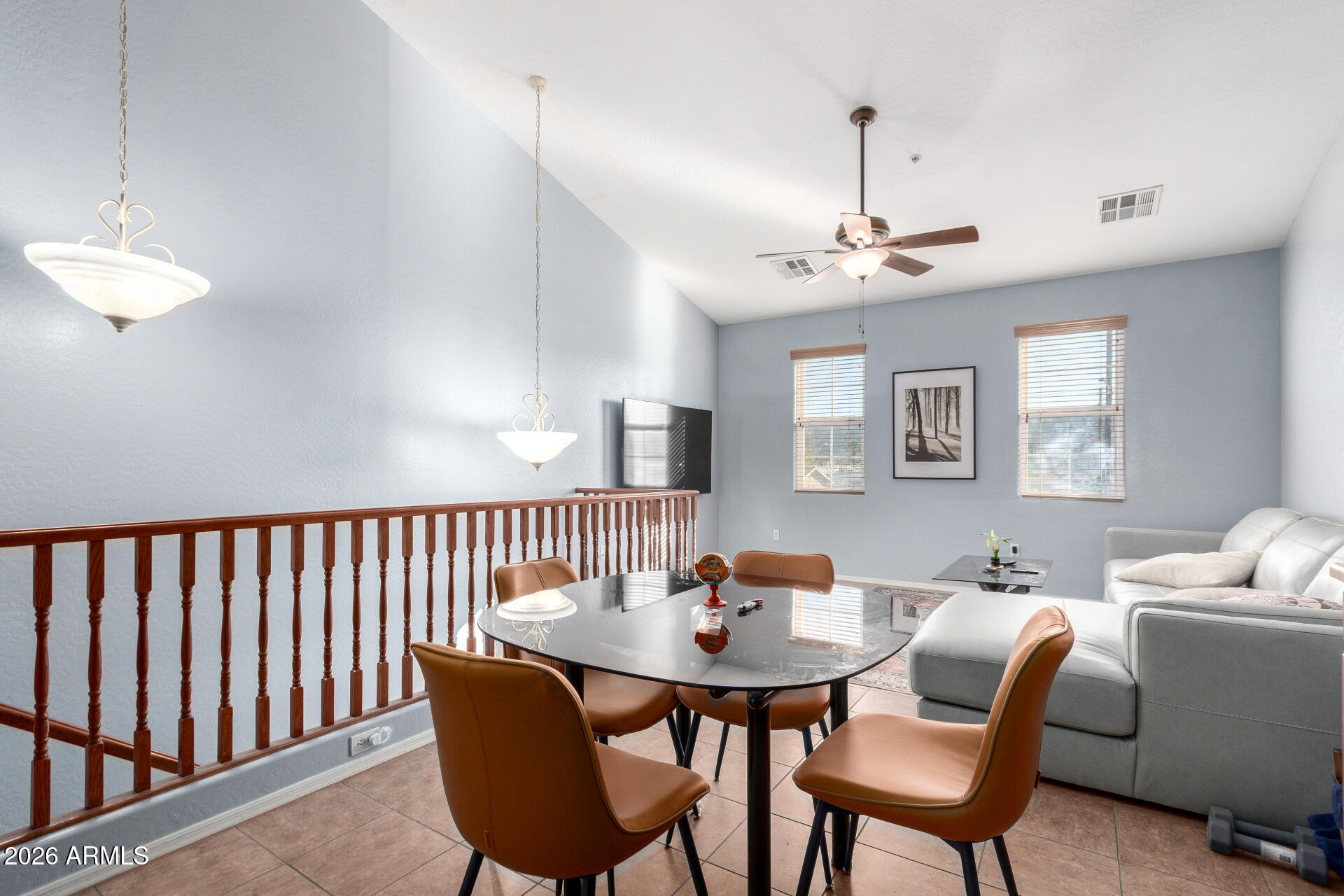 2257 East Huntington Drive Phoenix, AZ 85040 - Photo 8 of 25 a dining room with furniture a chandelier and window