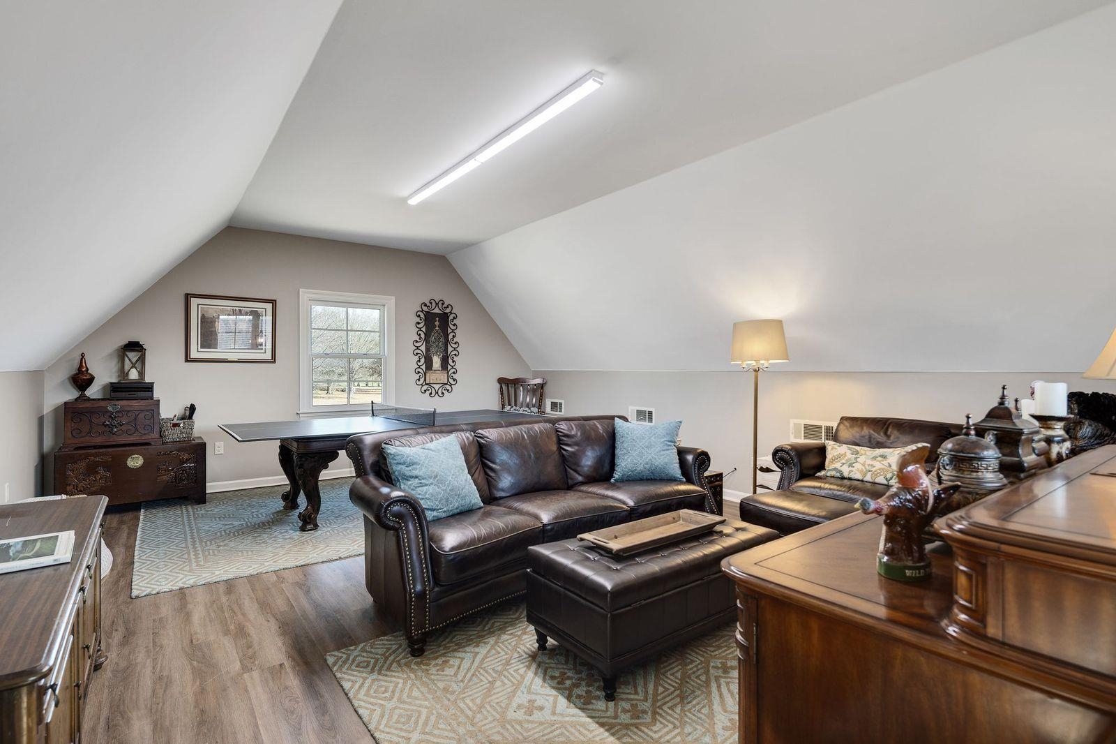 6085 Yum Yum Road Somerville, TN 38068 - Photo 26 of 40 a living room with furniture and wooden floor