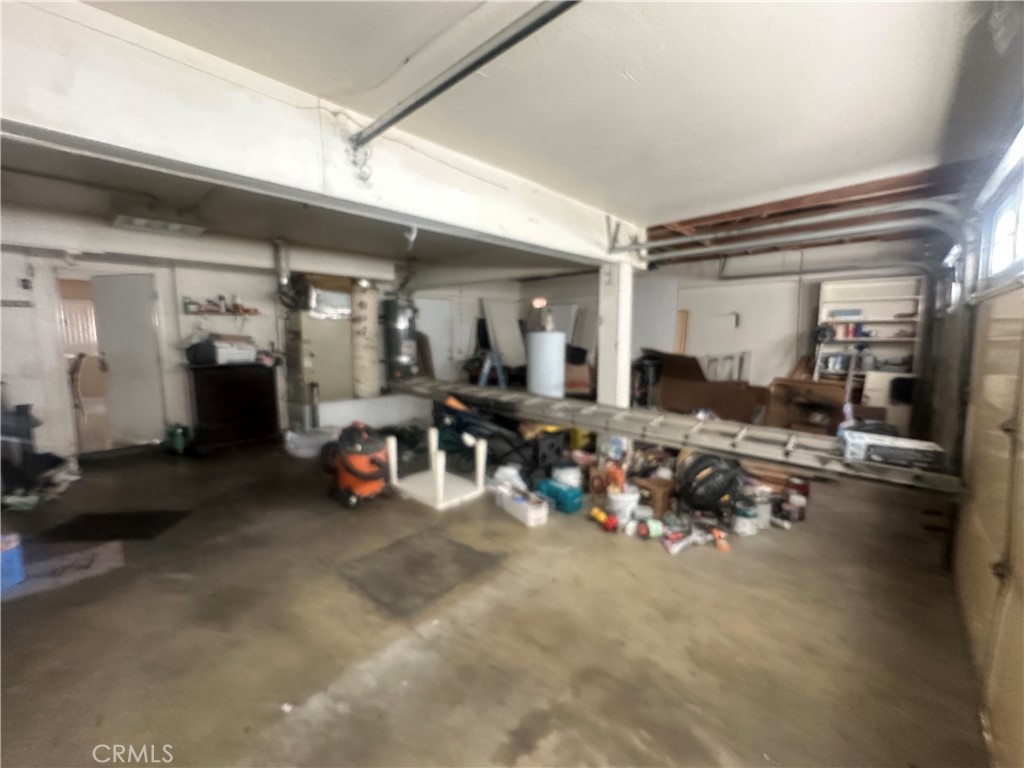 5147 Moonraker Road Palmdale, CA 93552 - Photo 18 of 21 a view of a room with gym equipment