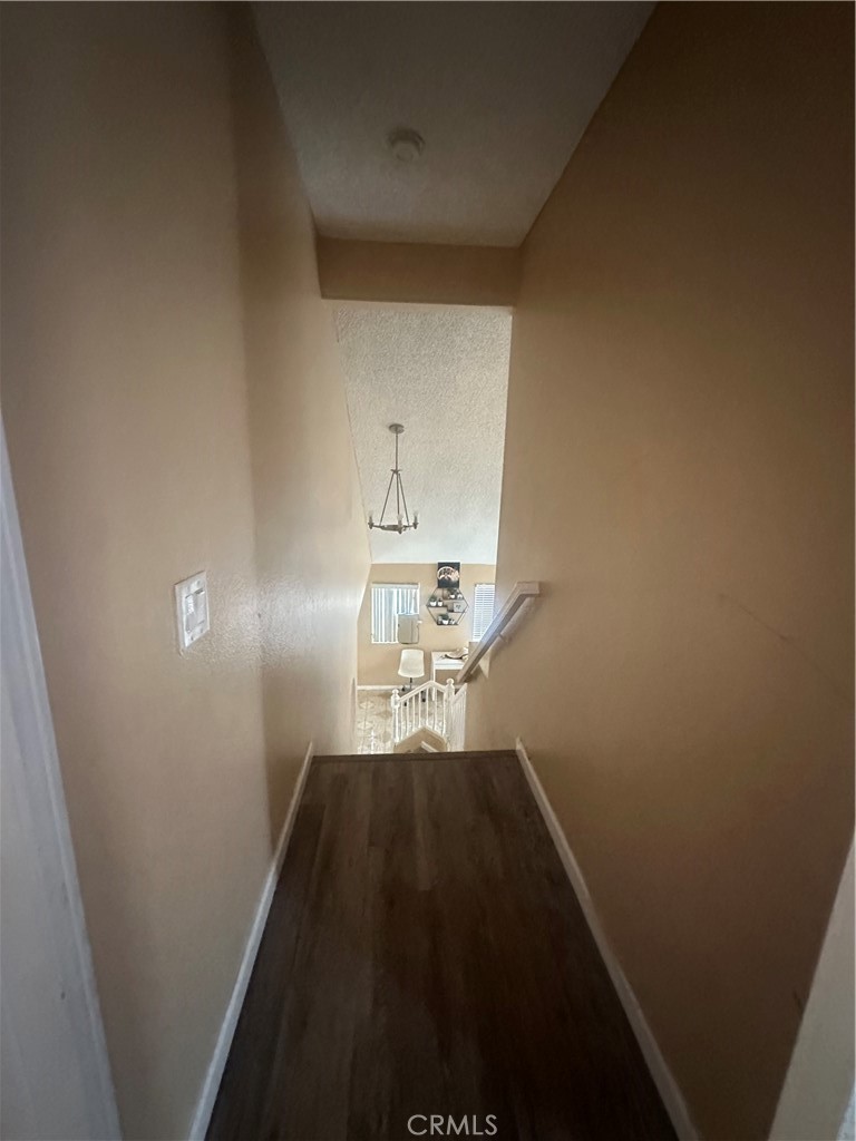 5147 Moonraker Road Palmdale, CA 93552 - Photo 10 of 21 a view of storage and utility room with wooden floor