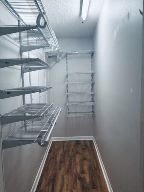 402 Juniper Street Destin, FL 32541 - Photo 11 of 20 a view of a room with racks on the wall
