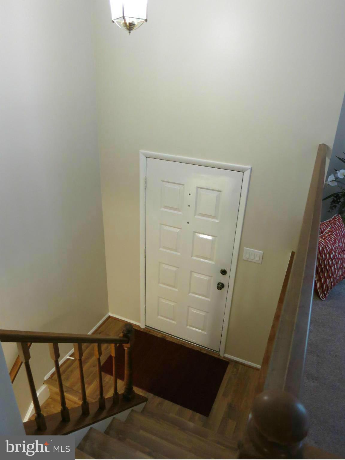 13705 Engleman Drive Laurel, MD 20708 - Photo 3 of 30 a view of a door and chair in a room