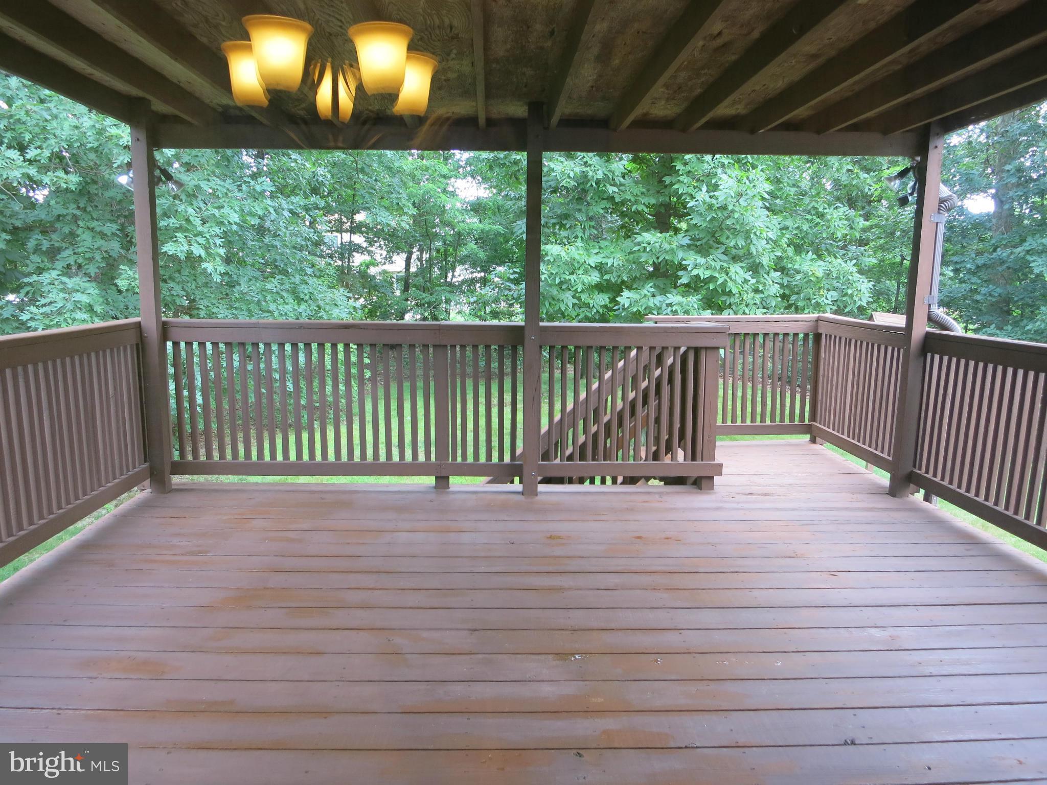 13705 Engleman Drive Laurel, MD 20708 - Photo 27 of 30 a view of balcony with wooden floor