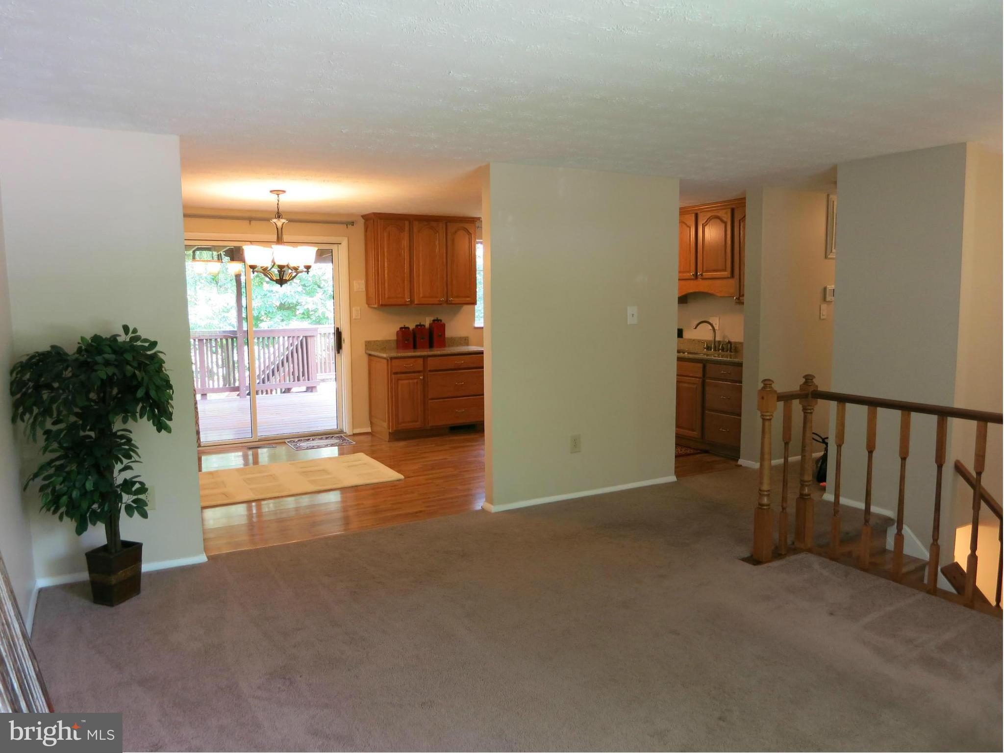 13705 Engleman Drive Laurel, MD 20708 - Photo 6 of 30 a view of a kitchen with furniture and a natural light