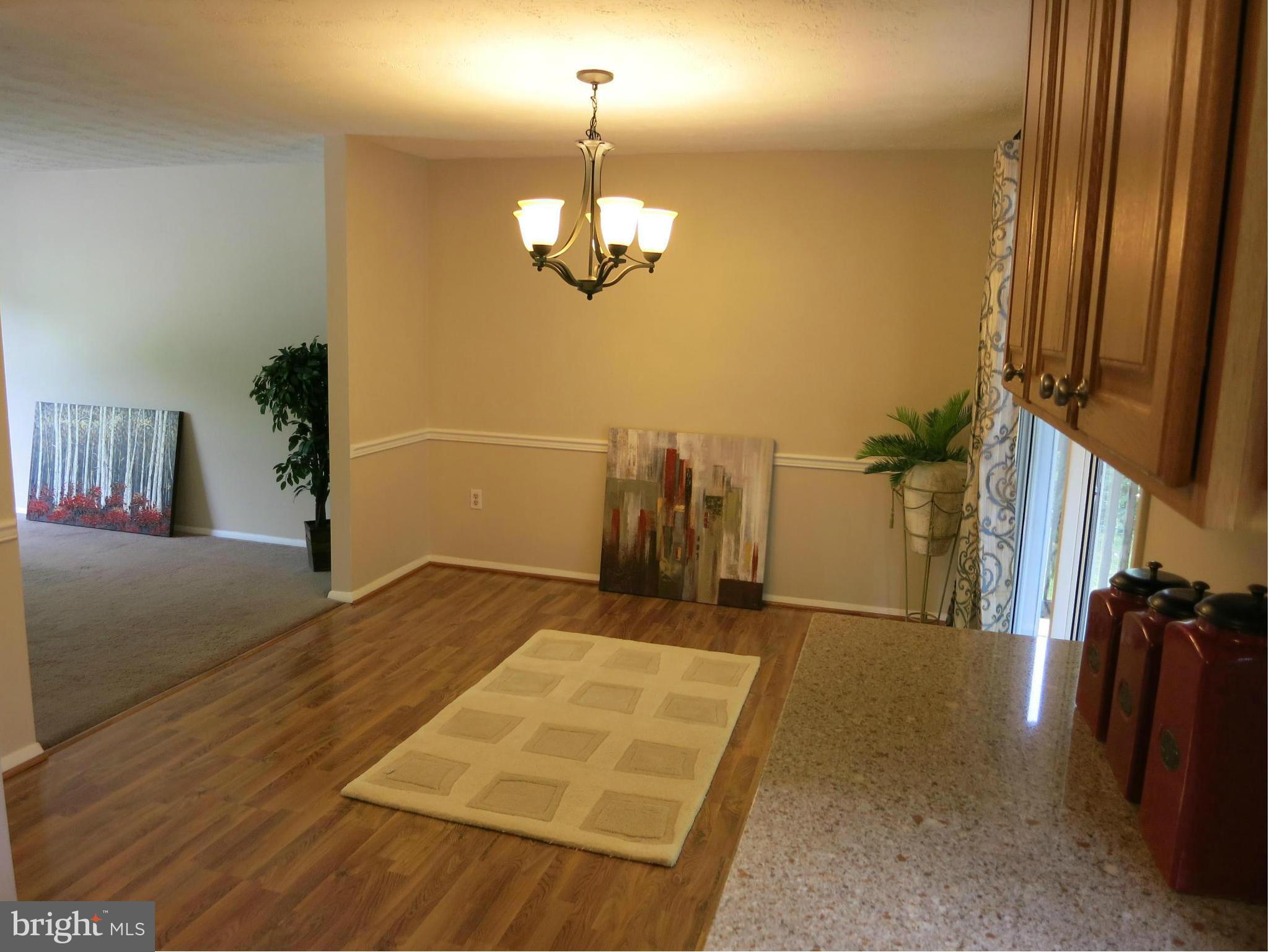 13705 Engleman Drive Laurel, MD 20708 - Photo 10 of 30 a view of a livingroom with a chandelier