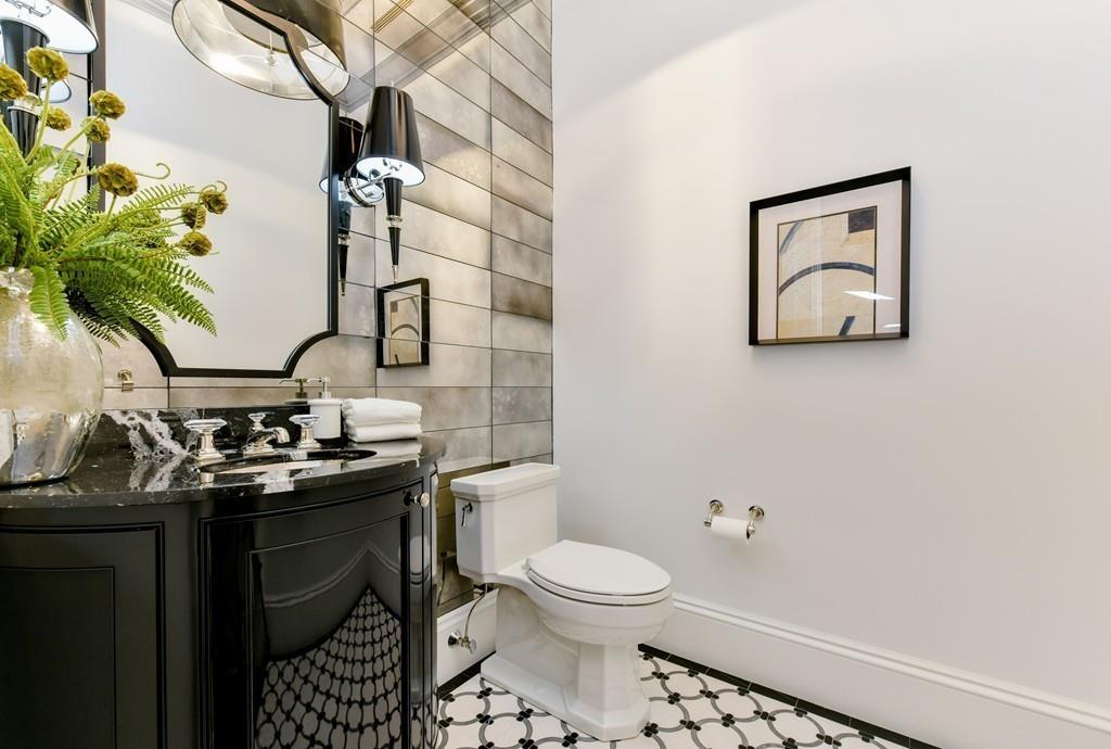 175 Beacon Street Boston, MA 02116 - Photo 14 of 35 a bathroom with a sink toilet and mirror