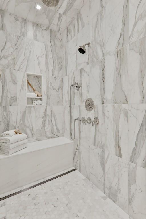 175 Beacon Street Boston, MA 02116 - Photo 24 of 35 a bathroom with a bathtub and shower